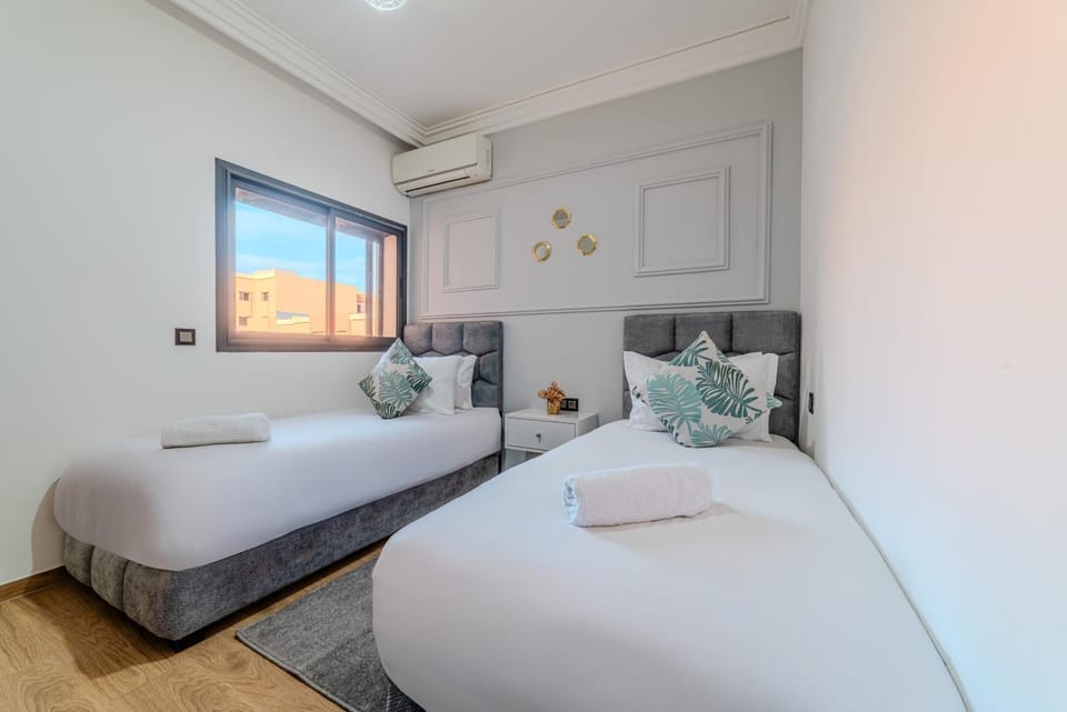 Bed, Photo of the whole room, Bedroom, towels, air conditioner