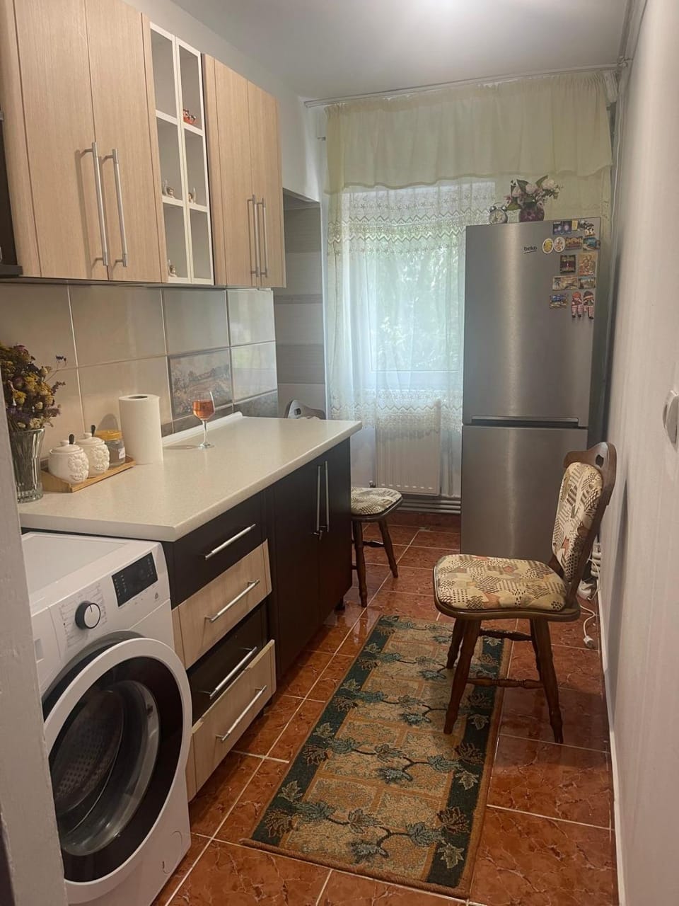 Kitchen or kitchenette, washing machine
