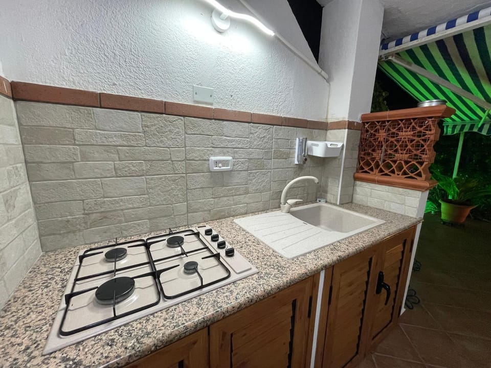 Kitchen or kitchenette, stove
