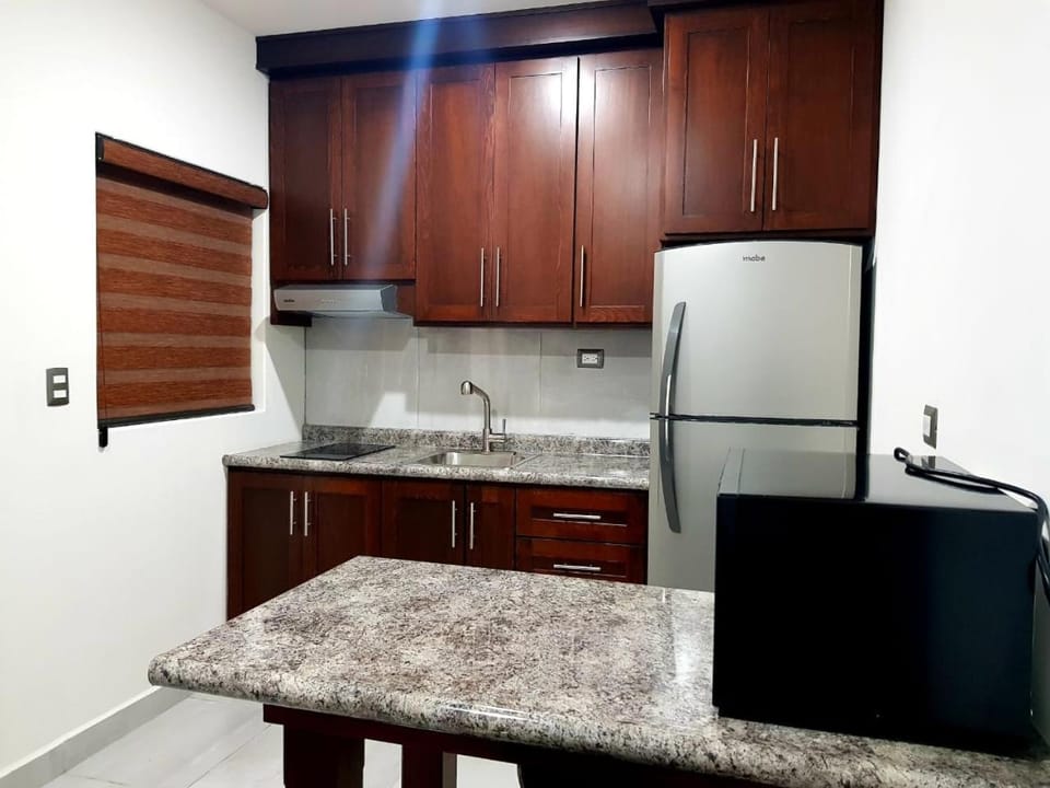 Kitchen or kitchenette, dishwasher, microwave, minibar