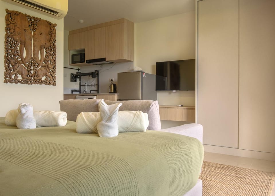 Bed, Living room, Seating area, Bedroom