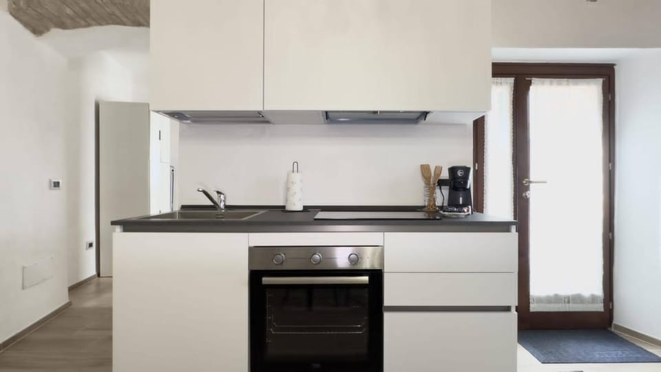 Kitchen or kitchenette, oven, stove