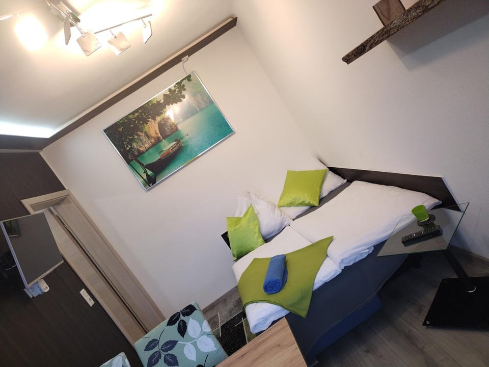 Bed, Living room, Seating area