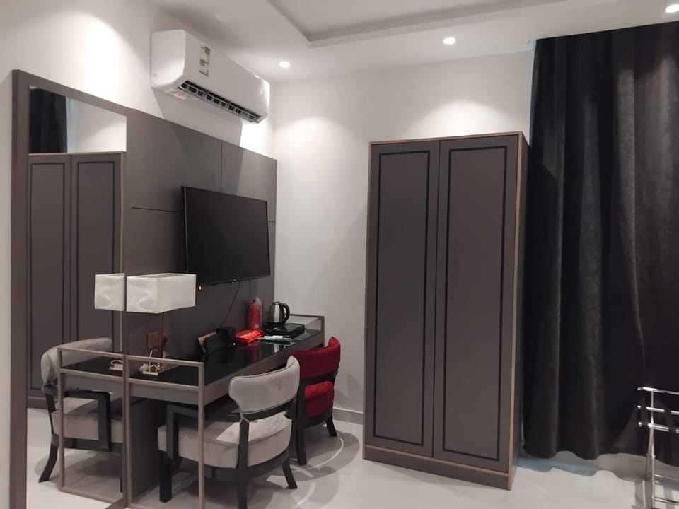 TV and multimedia, wardrobe, air conditioner