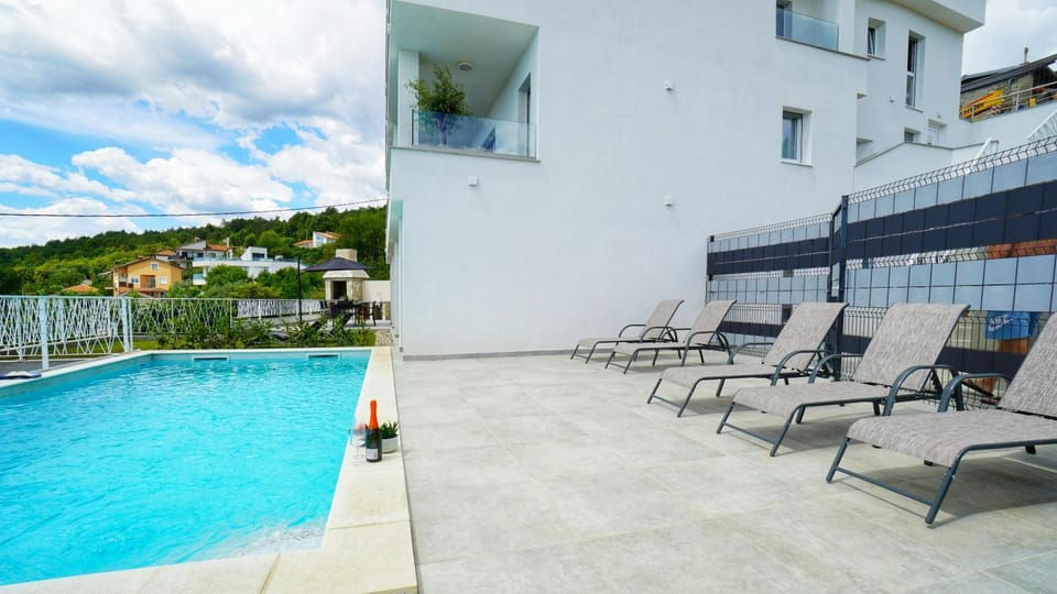 Property building, Day, View (from property/room), Balcony/Terrace, Pool view, Swimming pool, sunbed