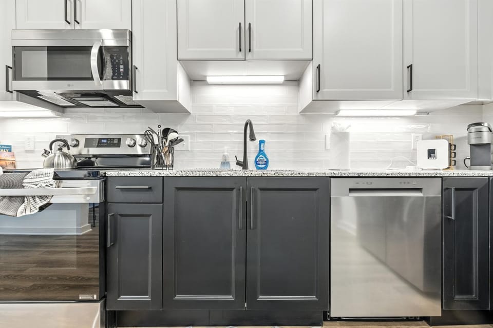 Kitchen or kitchenette, dishwasher, oven, stove