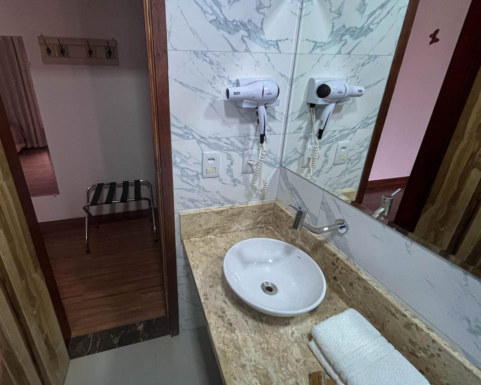 Shower, Bathroom, hair dryier, towels