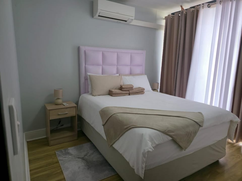 Bed, air conditioner
