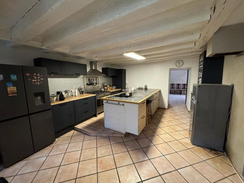 Kitchen or kitchenette, dishwasher, oven, stove