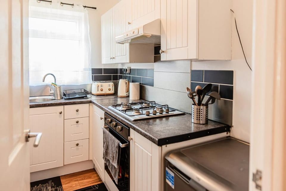 Kitchen or kitchenette, oven, stove, toaster