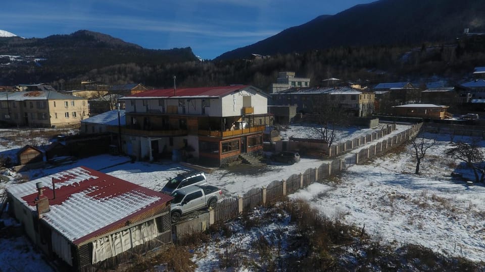Property building, Nearby landmark, Day, Natural landscape, Bird's eye view, Winter, Mountain view