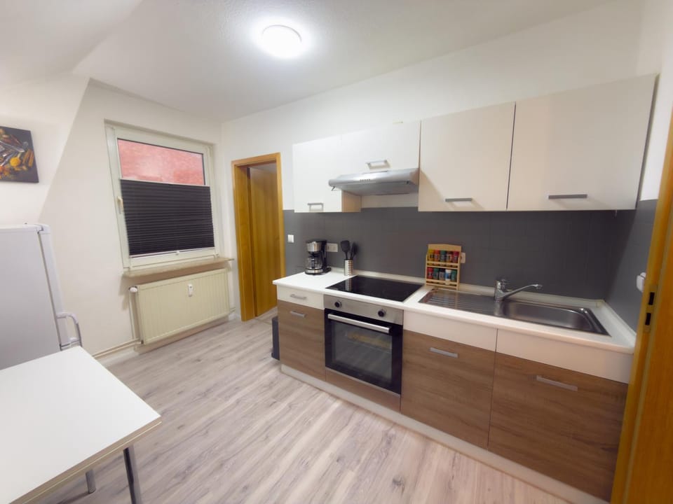 Kitchen or kitchenette, stove, kitchen