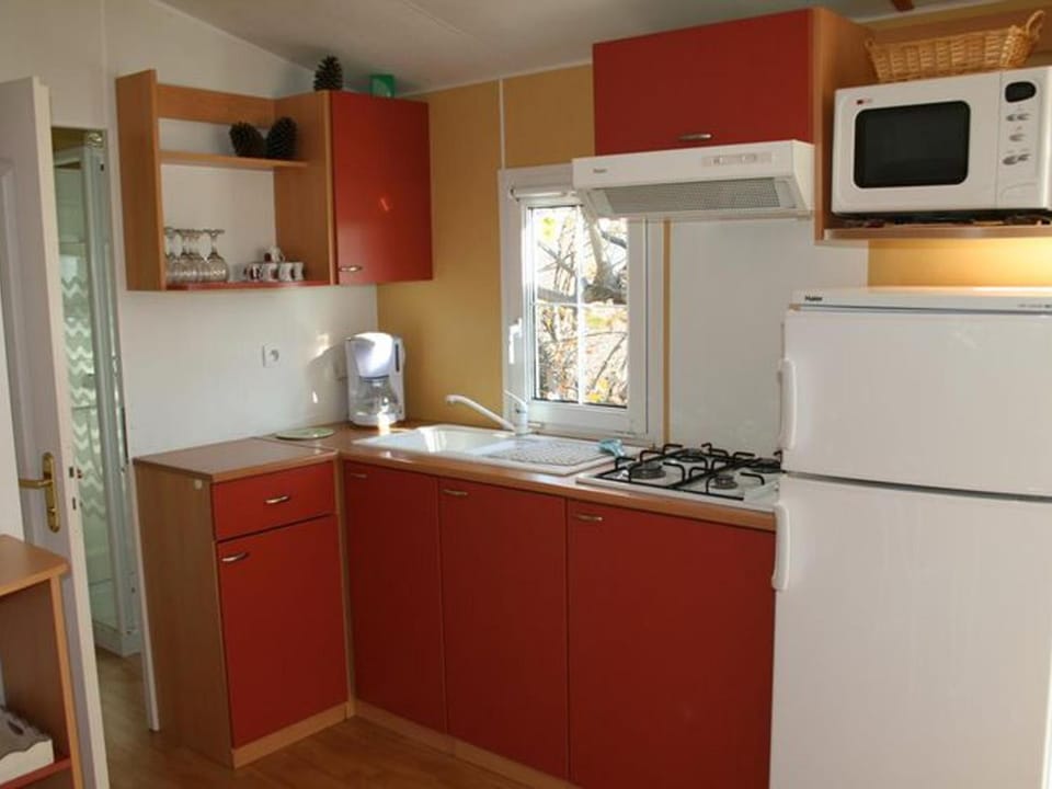 Mobil Home avec Terrasse pour 4 personnes à Ribes - API-1-52-447 Campground/ 
RV Resort in Auvergne-Rhône-Alpes