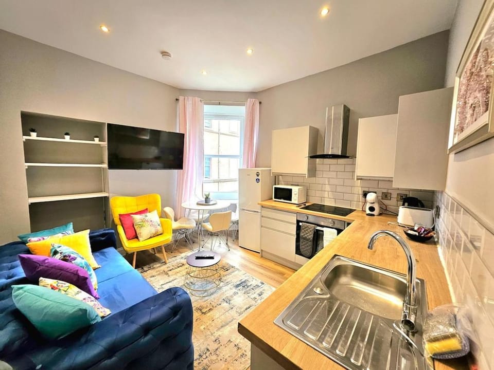 Kitchen or kitchenette, Living room, Dining area, oven, stove, toaster