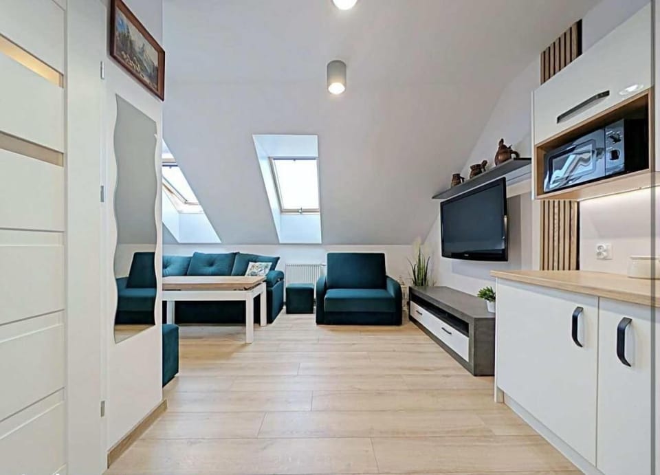 Kitchen or kitchenette, Living room, Seating area, stove