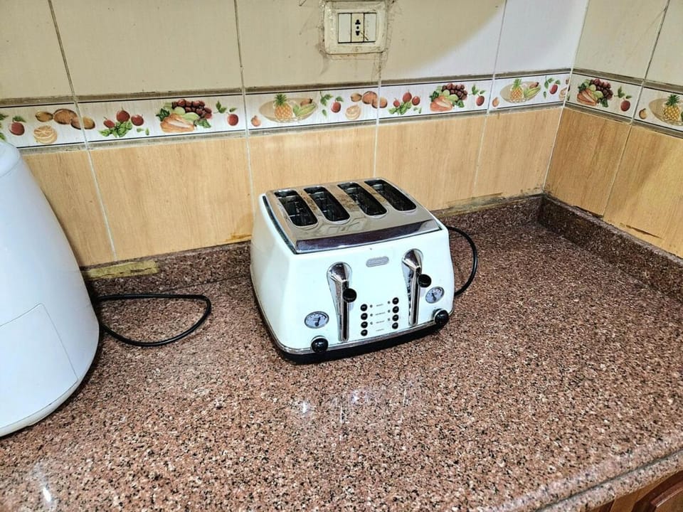 Kitchen or kitchenette, toaster
