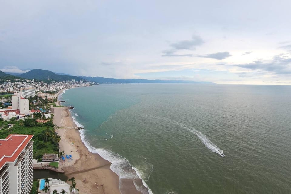 Amazing Sunsets Are Just The Beginning 3 bed 4 bath Luxury 24th Floor Oceanfront Condo House in Puerto Vallarta