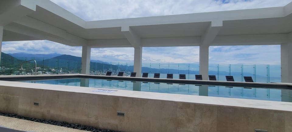 Amazing Sunsets Are Just The Beginning 3 bed 4 bath Luxury 24th Floor Oceanfront Condo Apartment hotel in Puerto Vallarta