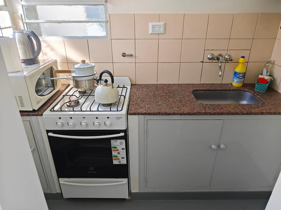 Kitchen or kitchenette, stove