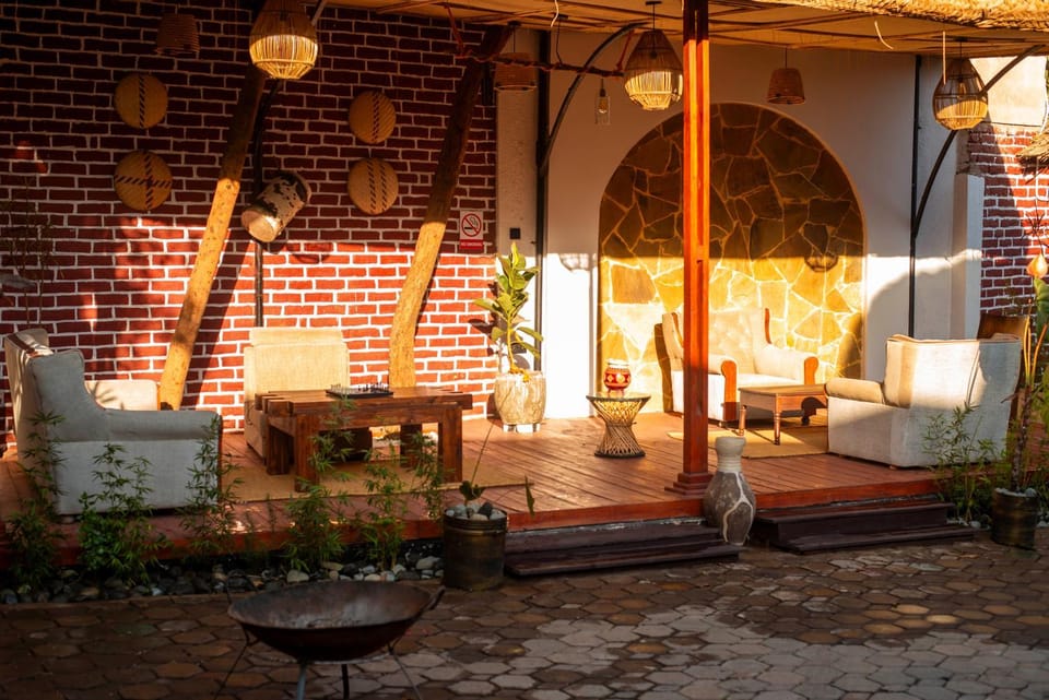 Property building, Patio, Day, Seating area, fireplace, Internal: Not applicable to any particular room