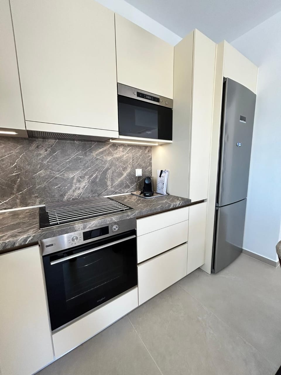 Kitchen or kitchenette, oven, stove