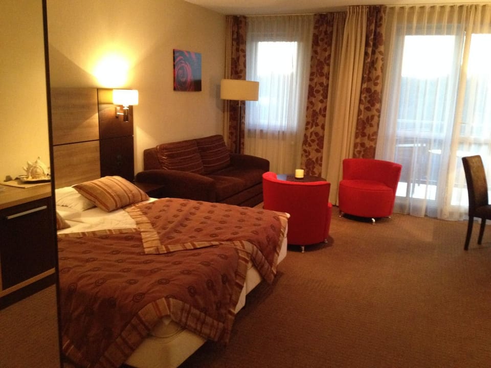 Bed, Living room, Seating area, Bedroom