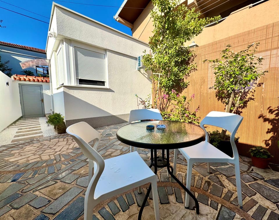Property building, Patio, Day, View (from property/room), Seating area