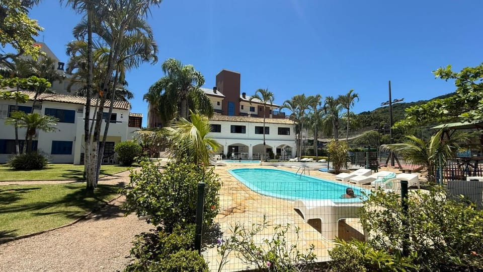 BEIRA DA PRAIA CONDOMINIO PRAIAS BRANCAS, PRAIA CACHOEIRA BOM JESU, FLORIANOPOLIS, casa 70 House in Florianopolis