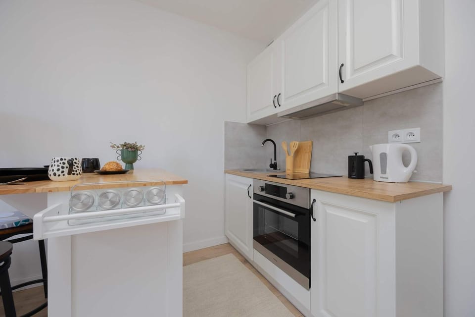 Kitchen or kitchenette, oven