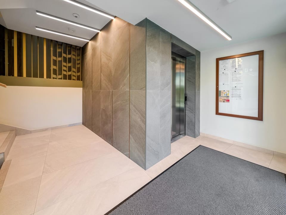 Property building, elevator