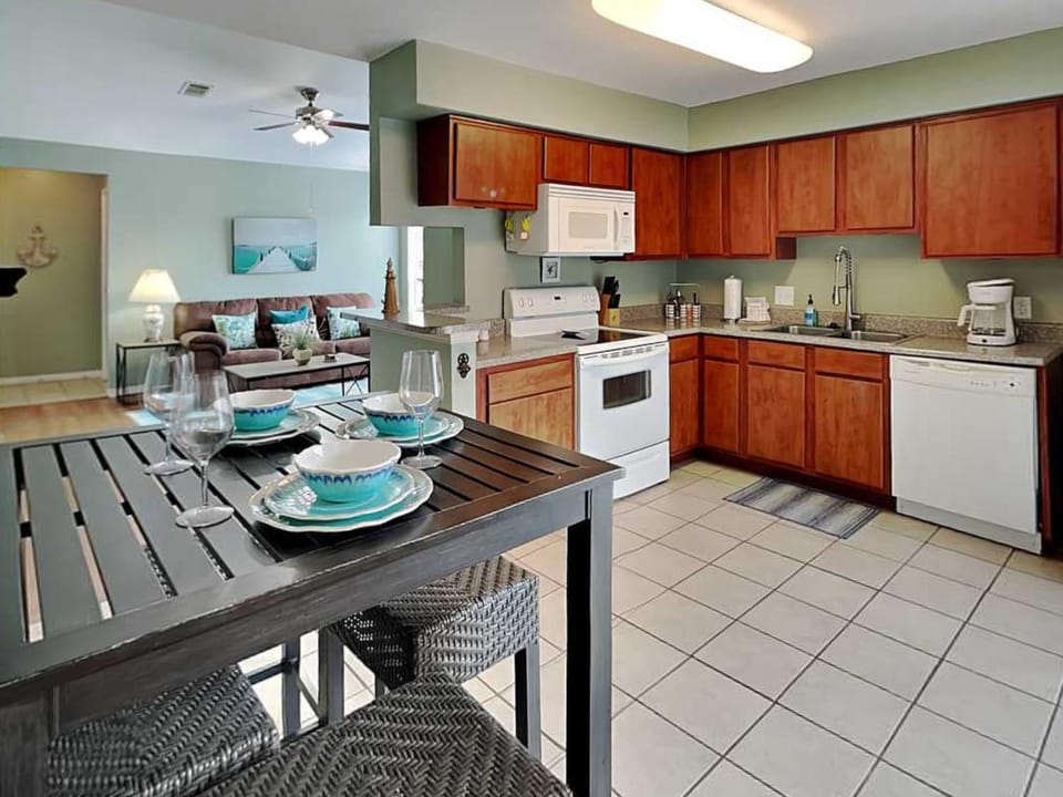 Kitchen or kitchenette, Dining area, furniture, microwave, stove