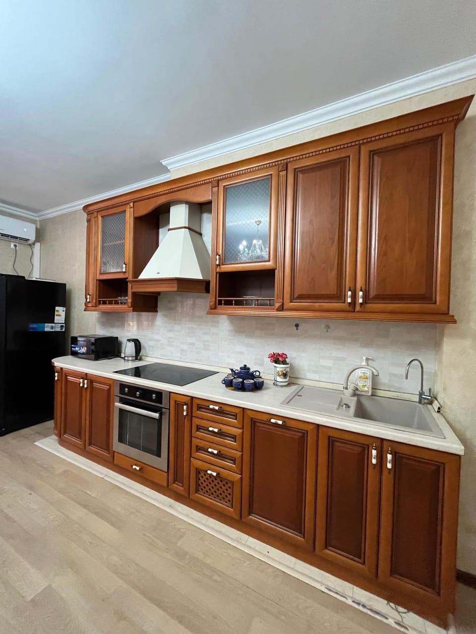 Kitchen or kitchenette, dishwasher, oven, stove