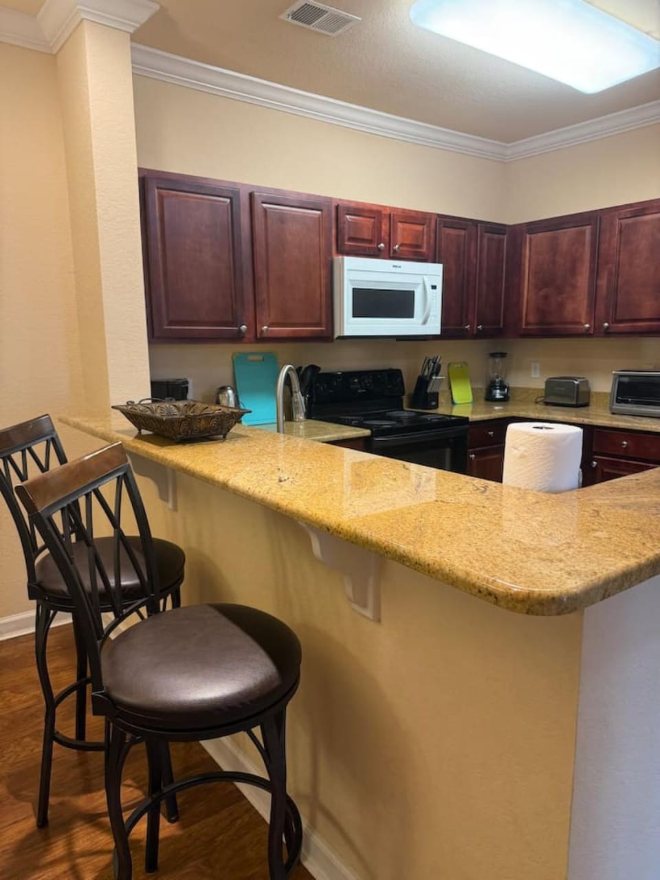 Kitchen or kitchenette, oven, stove, toaster