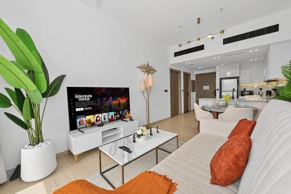 Golden Stays - Binghatti Crescent I Cozy 1BR Retreat I Pool & Gym I JVC Dubai Apartment in Dubai