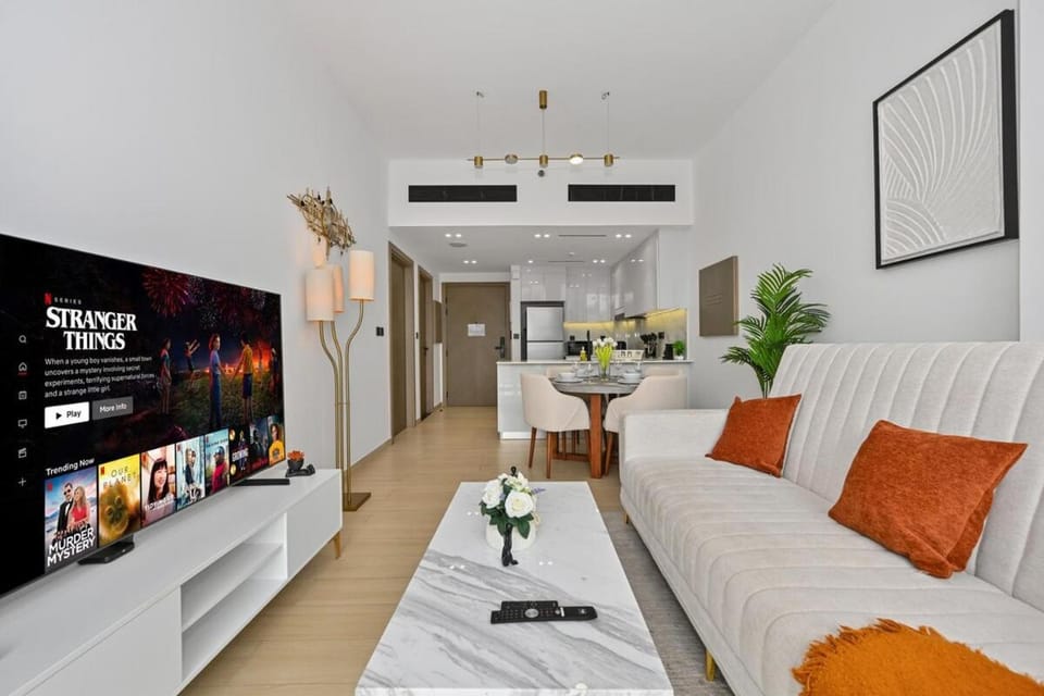 Golden Stays - Binghatti Crescent I Cozy 1BR Retreat I Pool & Gym I JVC Dubai Apartment in Dubai