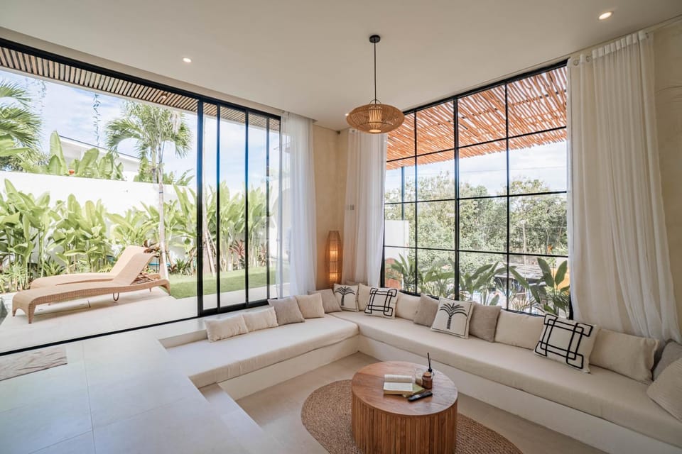 Living room, Seating area, Garden view, Pool view