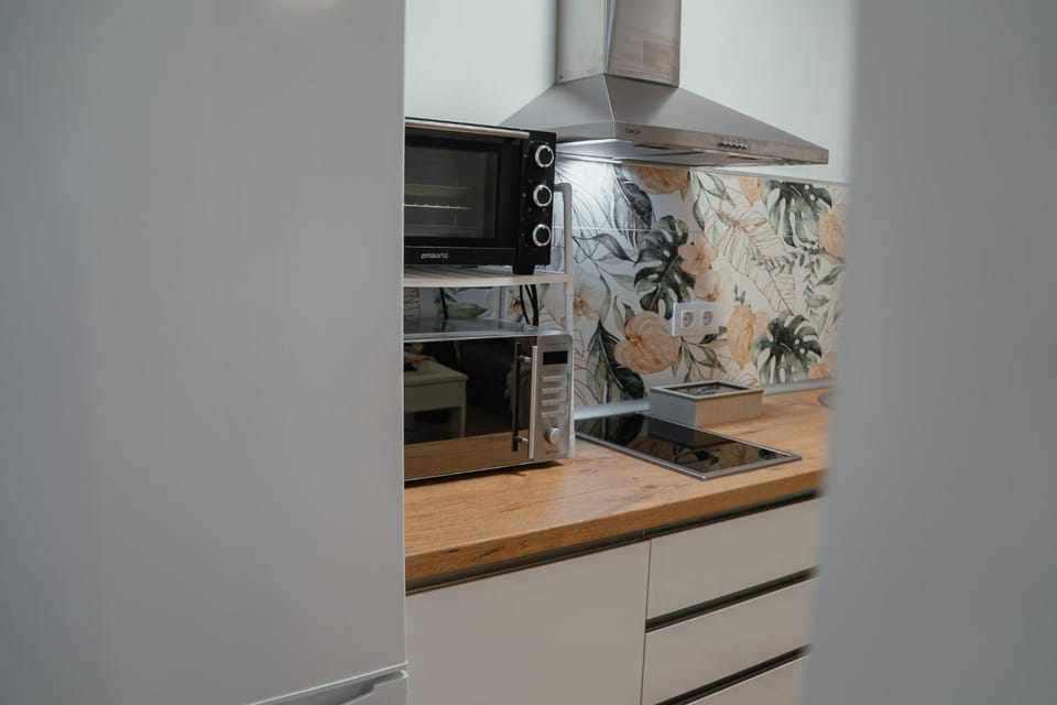 Kitchen or kitchenette, stove