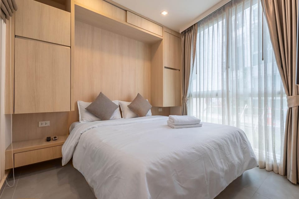 Olympus city garden direct pool access apartment by Sankalp Apartment in Pattaya City