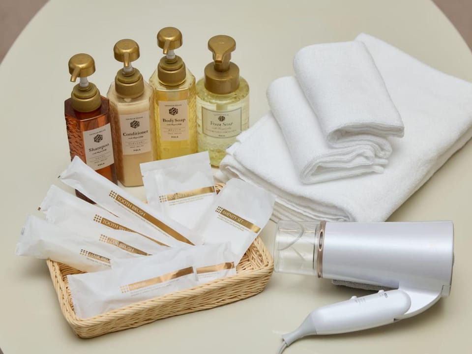 Photo of the whole room, hair dryier, towels
