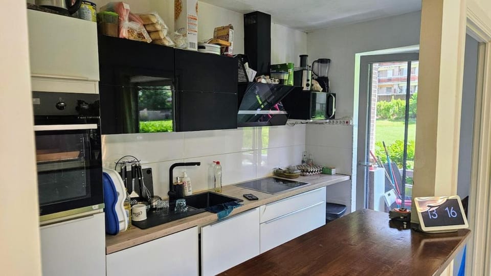 Kitchen or kitchenette, dishwasher, stove, toaster