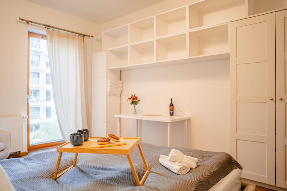 Seating area, towels, wardrobe