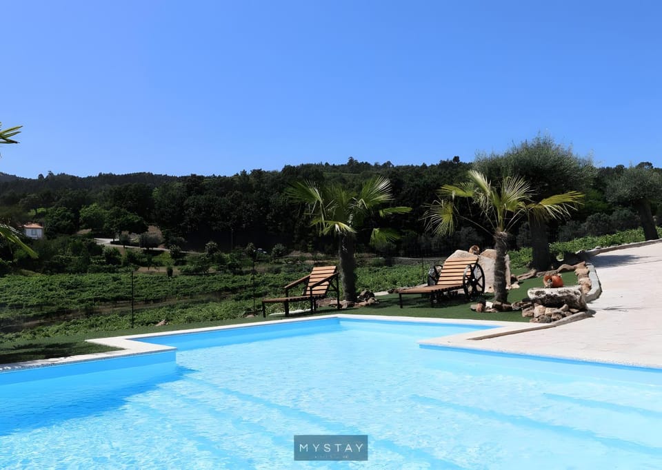 Property building, Living room, Swimming pool