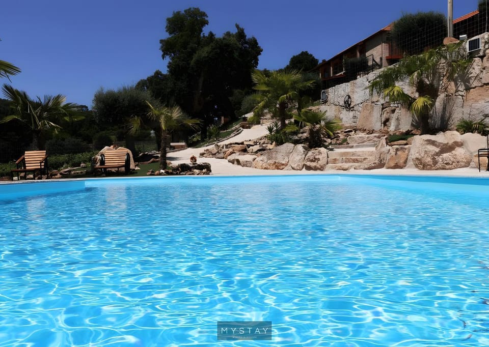 Property building, Living room, Swimming pool