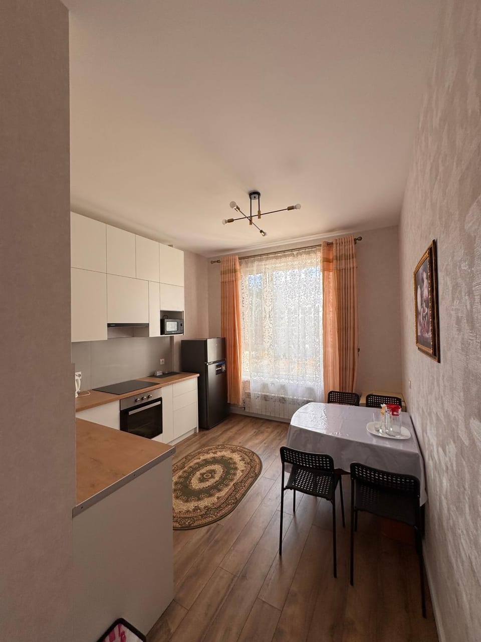 Kitchen or kitchenette, Photo of the whole room, Dining area, oven, stove