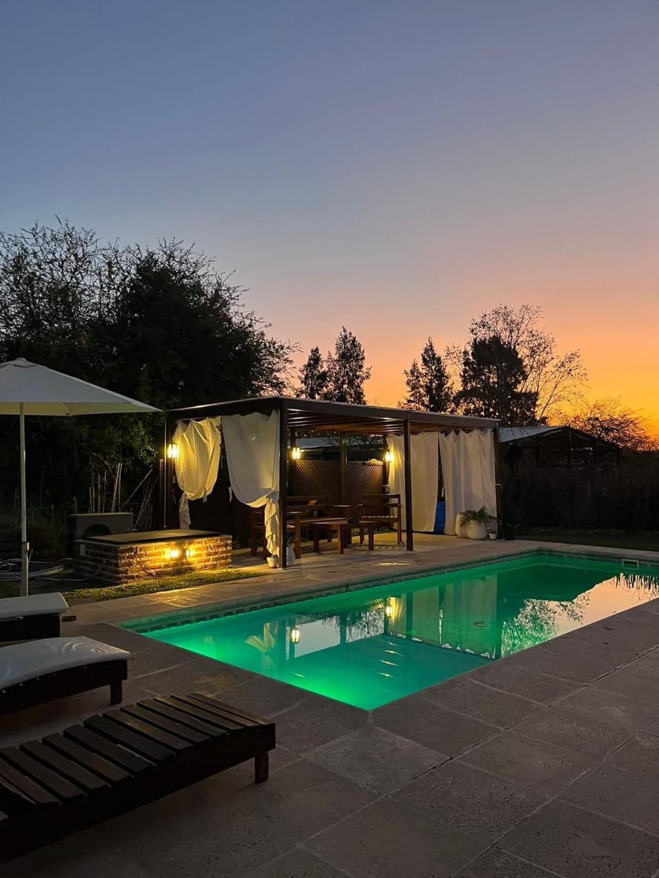 Patio, Day, Natural landscape, Pool view, Swimming pool, Sunrise, Sunset, sunbed
