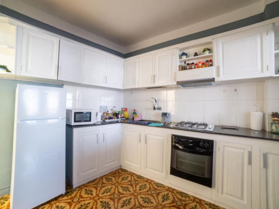 Kitchen or kitchenette, microwave, oven
