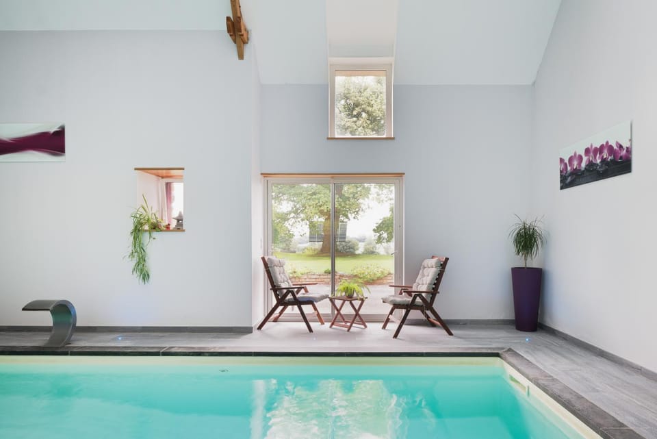 Property building, Living room, Swimming pool