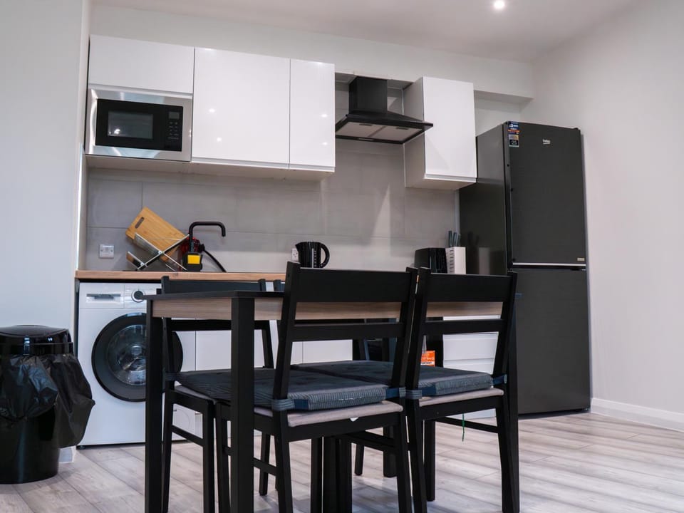 Kitchen or kitchenette, Dining area, oven, stove, toaster