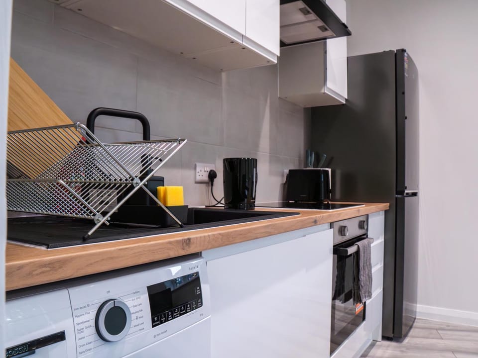Kitchen or kitchenette, stove, toaster