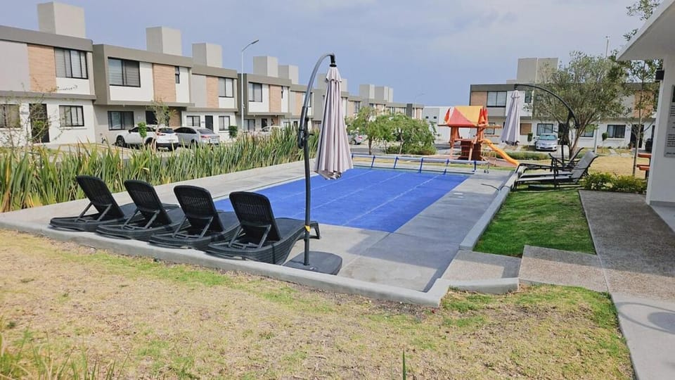 Tu espacio ideal en Intercity Urban Corridor House in State of Querétaro